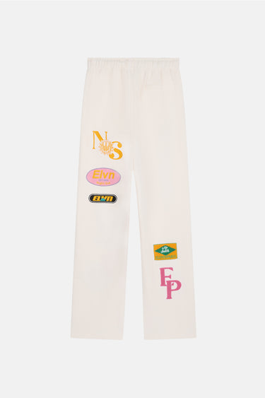 Jogging Joviel Écru vu de dos à plat, patchs colorés NS, Eleven et FP sur les jambes, fond blanc