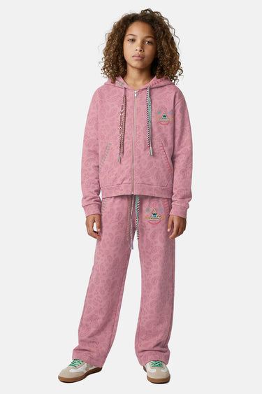 Jogging Tika Rose Bandana porté par une fille avec le sweat à capuche zippé assorti, imprimé bandana rose, de face