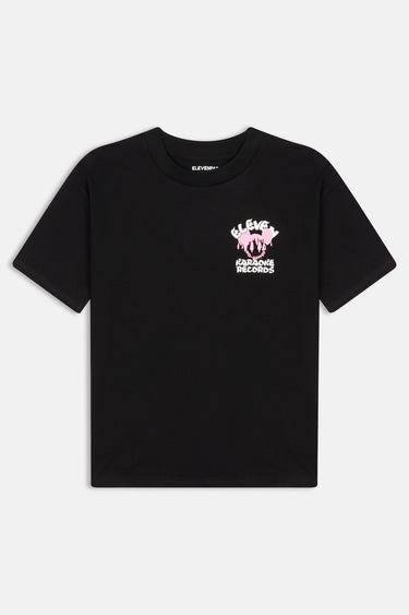 T-shirt Next Noir de face à plat, logo Eleven Karaoke Records rose et blanc sur la poitrine