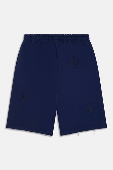 Short Ninon Bleu Marine vu de dos à plat, fleurs de lys tonales brodées et bas à bord brut