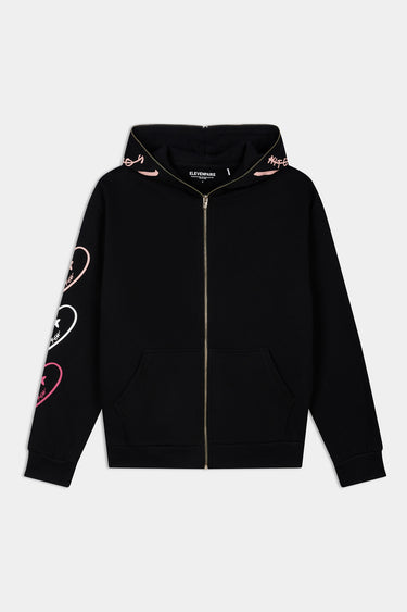 Sweat à capuche zippé Pyroma Noir à plat, de face, trois cœurs rose et blanc sur la manche, broderies sur la capuche
