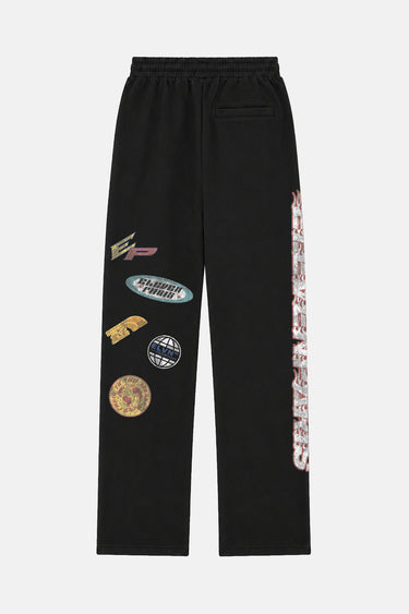 Jogging Tarik Noir vu de dos à plat, patchs colorés sur la jambe et poche arrière