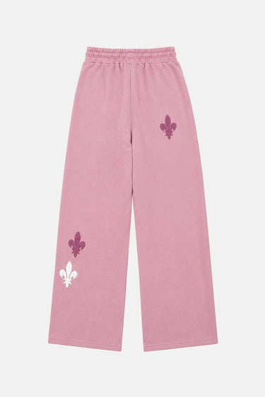 Jogging Tilman Rose à plat de dos, jambe large et fleurs de lys violette et blanche