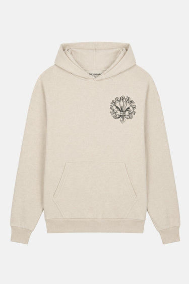 Sweat à capuche Tristan Écru Chiné de face à plat, poche kangourou et petite fleur de lys noire sur la poitrine