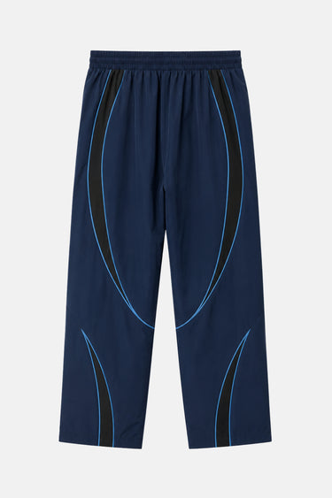 Pantalon de survêtement Tunis Bleu Marine vu de dos à plat, bandes courbes noires et liserés bleu clair