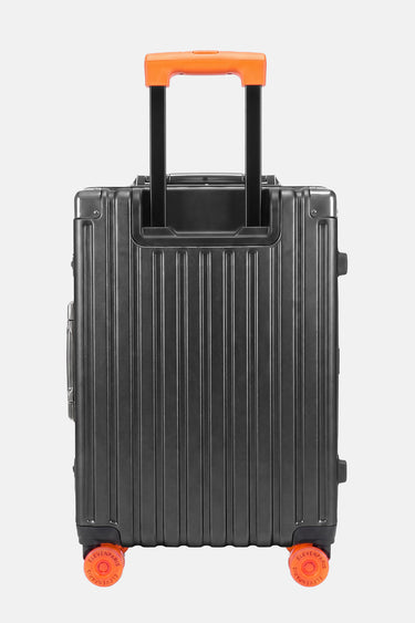 Valise Fugers Gris Foncé S vue de dos, coque rainurée gris anthracite, poignée télescopique et roulettes orange