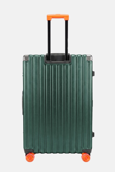 Valise Fugers Vert M vue de dos, coque rainurée vert forêt, poignée télescopique et roulettes orange